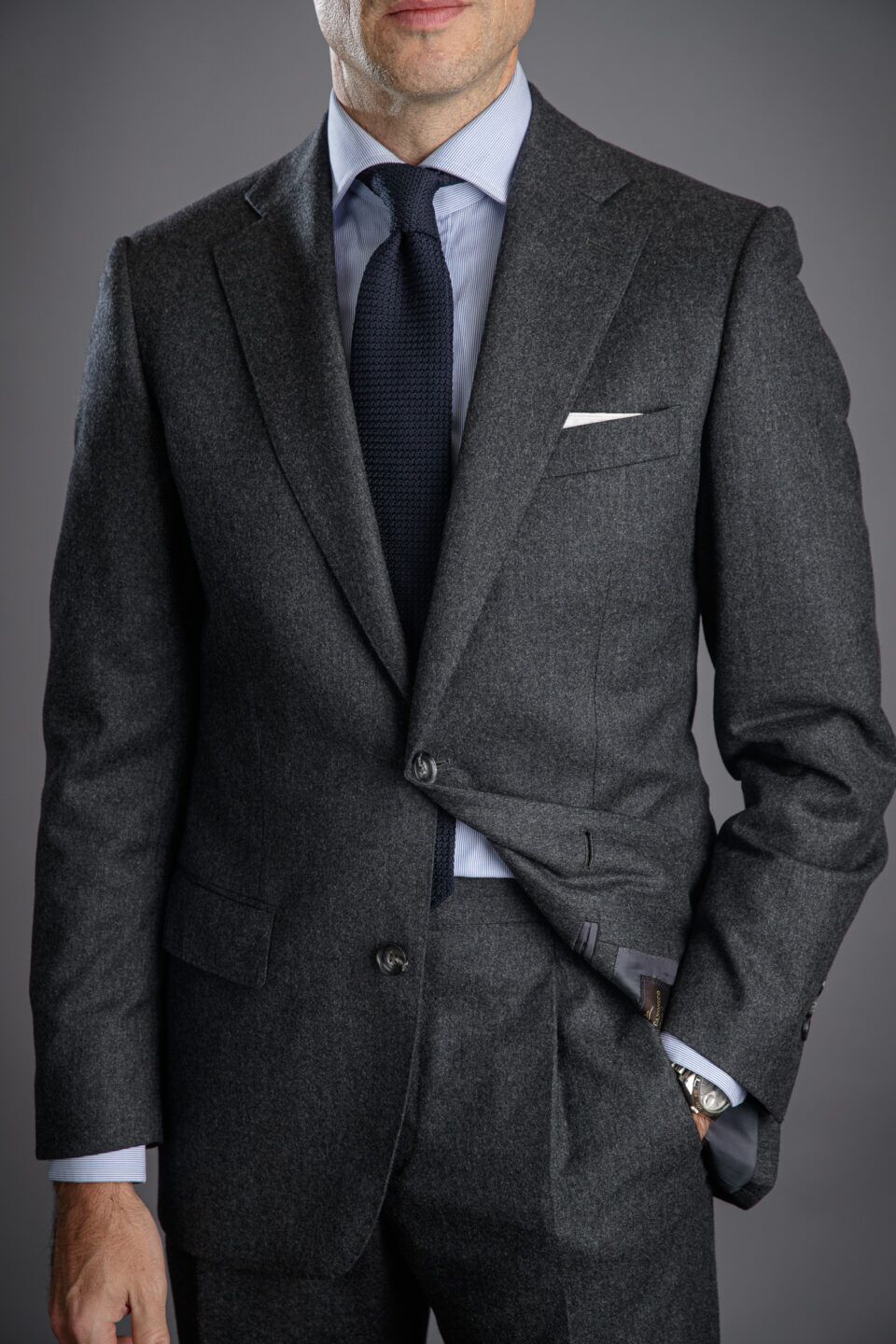 Close-Up of Charcoal Grey Flannel Suit Jacket – Luxurious Texture & Warmth