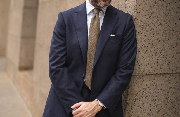 Custom navy blue flannel suit showcasing soft fabric and tailored fit.