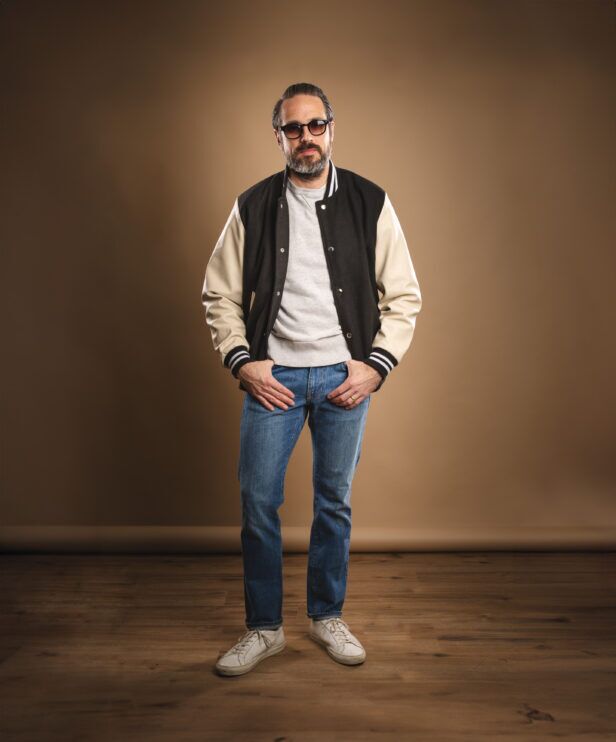 outfit idea featuring a black and white varsity jacket