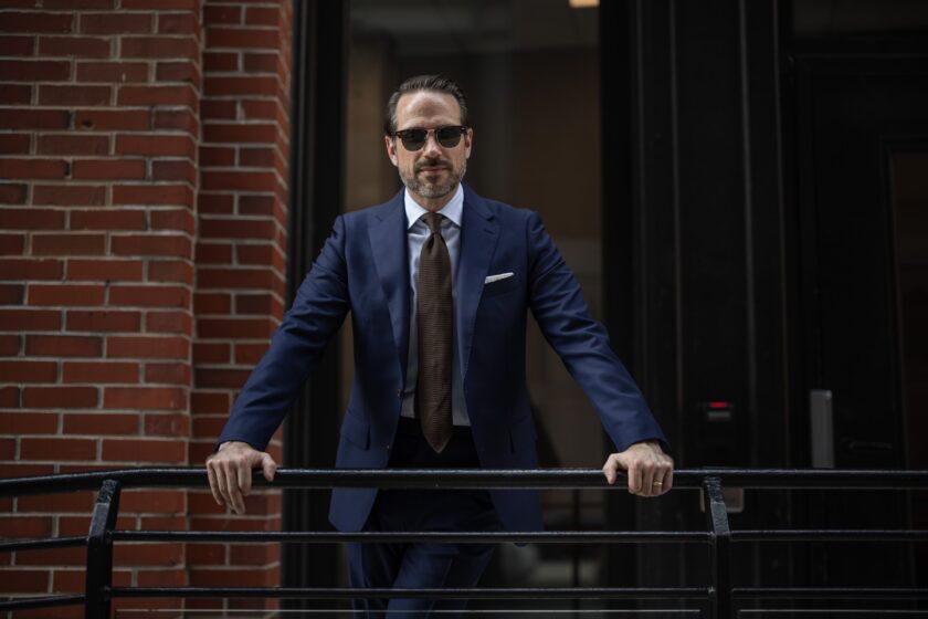 A men's outfit idea with a royal blue suit