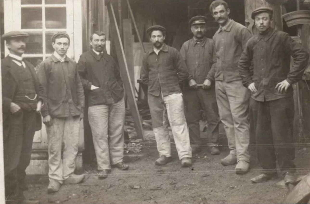 Vintage photo of men wearing chore coats