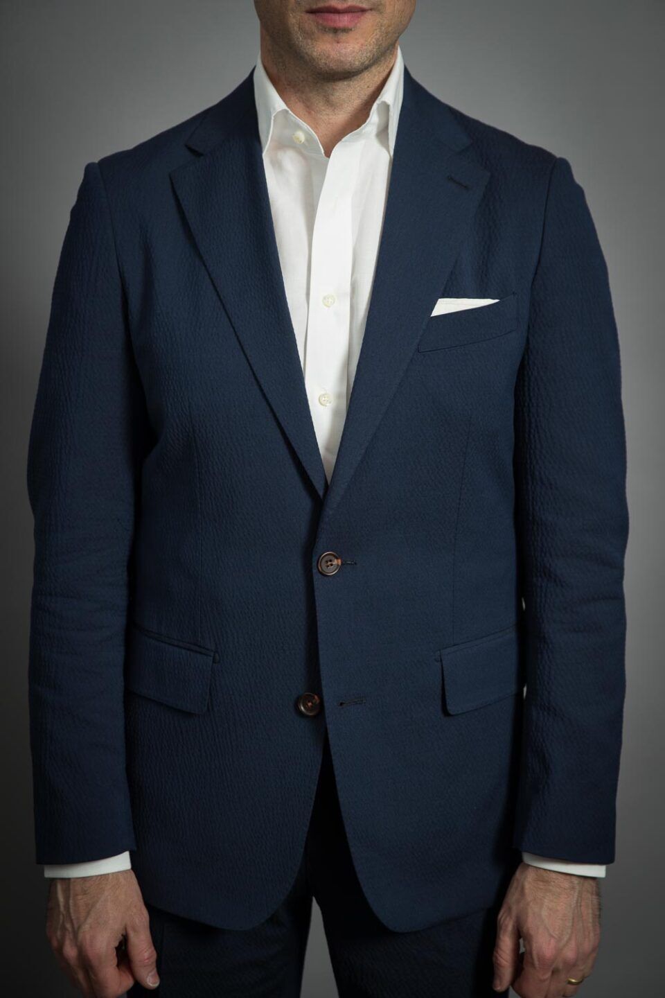 Close-Up of Navy Seersucker Fabric – Lightweight Texture & Deep Hue