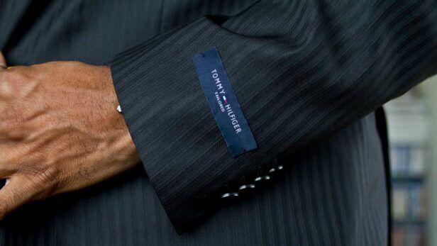 leaving label on suit sleeve