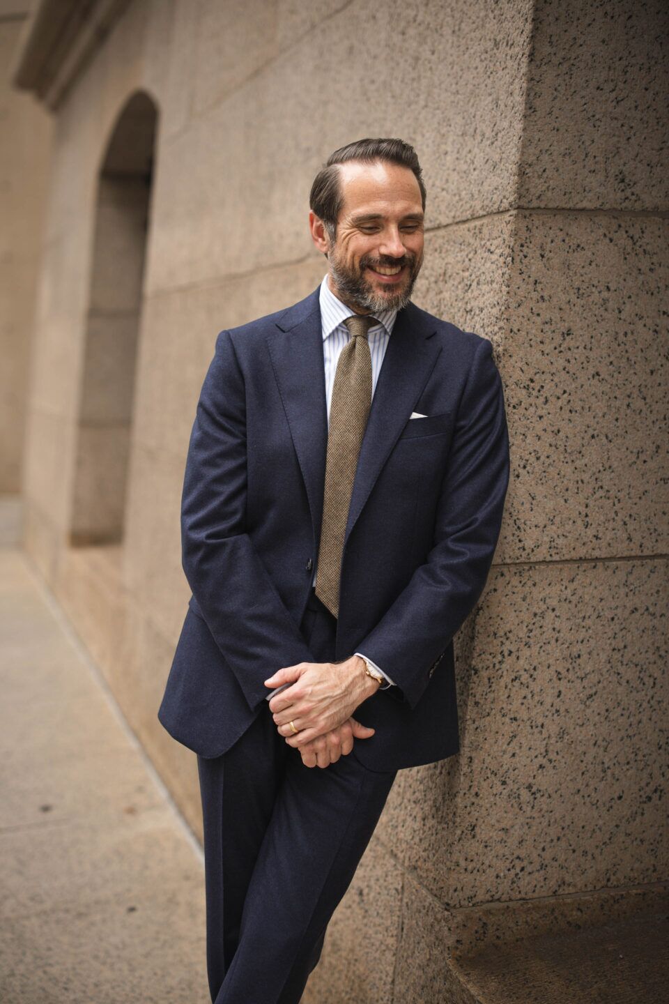 Custom navy blue flannel suit showcasing soft fabric and tailored fit.