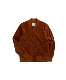 Tan cotton suede bomber jacket with ribbed collar, snap front and flap pockets, flat lay