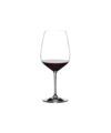 Stemmed crystal cabernet wine glass holding a pour of red wine, product shot on white