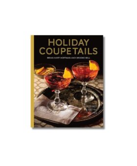 Holiday Coupetails cocktail recipe book with gold lettering and two red drinks in coupe glasses on the cover