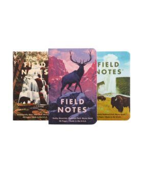 National Park series memo books with illustrated Great Smoky Mountains, Rocky Mountain and Yellowstone covers, flat lay