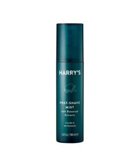 Post-shave mist with botanical extracts in a dark teal 100 ml pump bottle, product shot