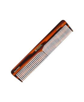 Tortoiseshell dressing table hair comb with coarse and fine teeth, flat lay