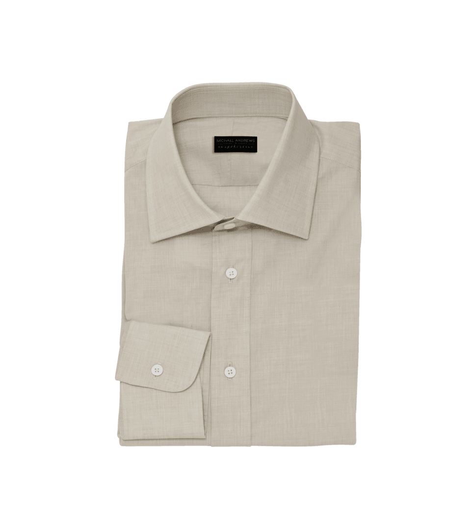 Sand linen dress shirt with spread collar and white buttons, folded flat lay