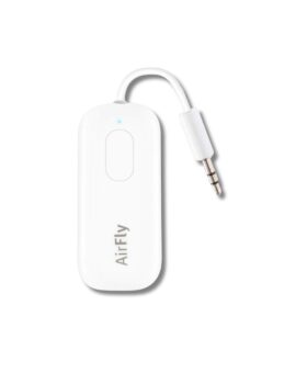 White AirFly Bluetooth audio transmitter with attached 3.5mm headphone jack, flat lay