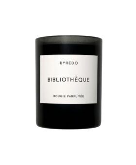 Byredo Bibliotheque scented candle in a black glass vessel with a white label