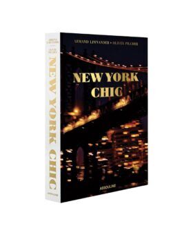 New York Chic by Assouline, black book cover with a night photograph of the Manhattan Bridge