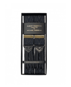 Black moire suspenders with gold hardware and leather ends, in a gift box