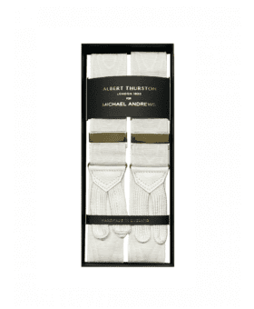 White moire suspenders with gold hardware and white leather ends, in a gift box