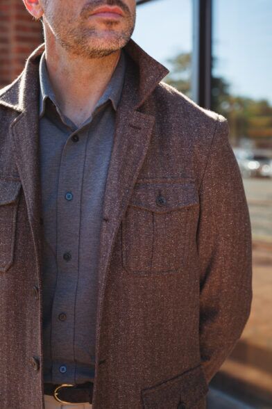 Brown herringbone flannel safari jacket, a close-up of the collar and chest pocket