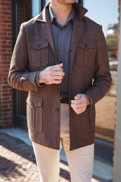 Brown herringbone flannel safari jacket with four patch pockets, a close-up of the front
