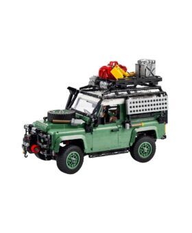 Green Lego Land Rover Defender model with a roof rack and spare wheel