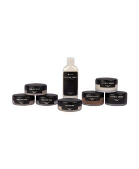 Paul Brunngard shoe care set with sublime wax, artistic cream, reviving cream and spitshine tins, flat lay