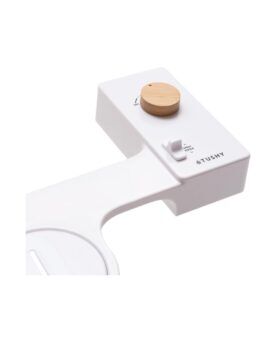 White bidet toilet seat attachment with a wooden control dial, angled view