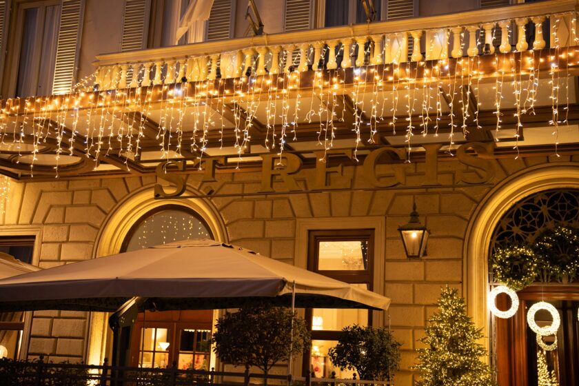 St Regis Florence sign above the entrance, lit with icicle lights at night