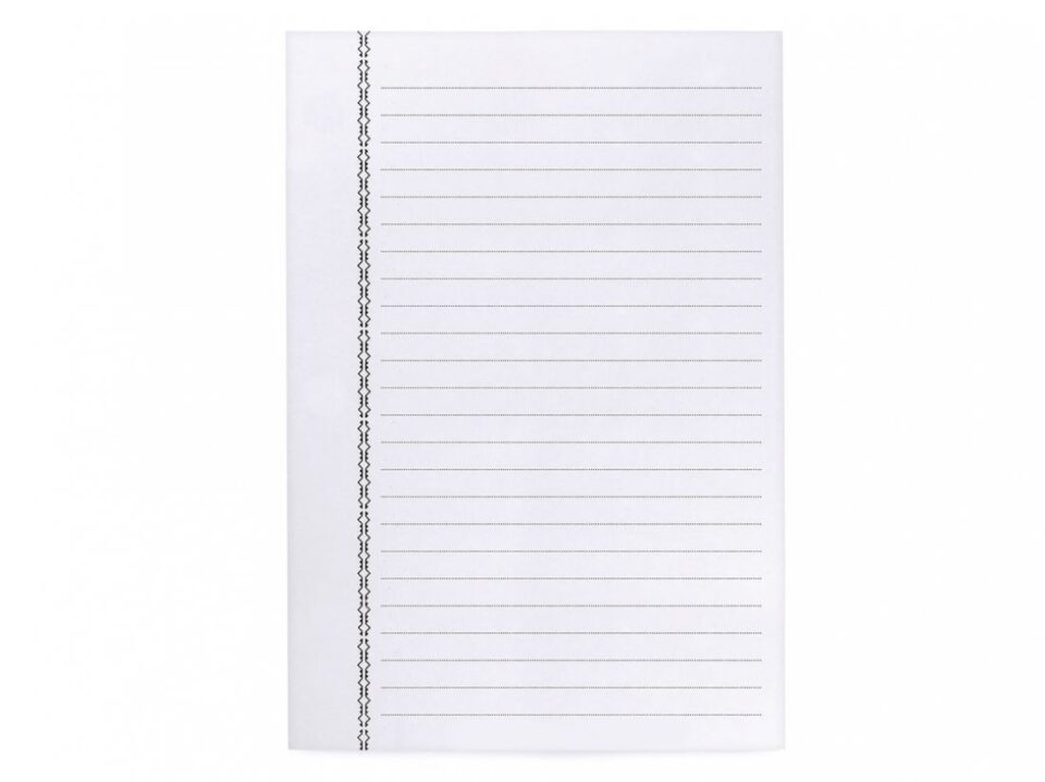 White lined notebook refill paper with black decorative margin border, flat lay