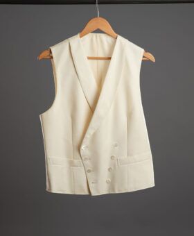 Ivory wool double-breasted formal waistcoat with shawl collar, shown on a hanger