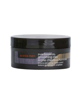 Men's grooming clay in a black screw-top jar, packaging shot on white