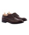 Dark brown leather split toe derby shoes with cedar shoe trees, product shot
