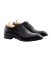 Black leather cap toe oxford dress shoes with leather soles and cedar shoe trees, product view