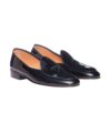 Black patent leather evening loafers with bow detail and leather soles, angled product view