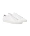 White leather low-top lace-up sneakers with gold heel numbering, pair shown at an angle
