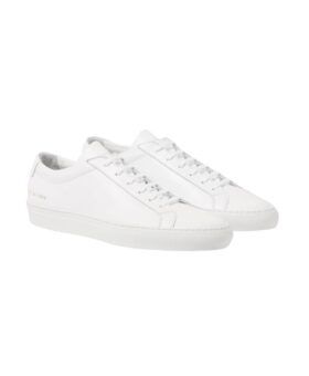 White leather low-top lace-up sneakers with gold heel numbering, pair shown at an angle
