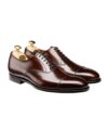 Dark brown polished leather cap toe oxford shoes with leather soles and shoe trees, product view