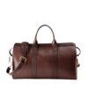 Chocolate brown shrunken grain leather travel duffle with brass hardware and shoulder strap, product view