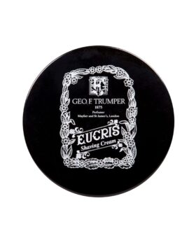 Eucris soft shaving cream in a black screw-top bowl with white floral label, viewed from above
