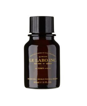 Beard oil in a 60ml amber glass bottle with black cap and gold lettering, product shot