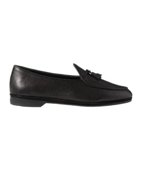 Black leather tasselled Belgian loafer with unlined slipper construction, side profile product shot