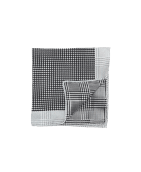 Black and white double-sided houndstooth and glen check wool pocket square, flat lay with folded corner