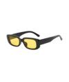 Rectangular black acetate sunglasses with yellow tinted lenses, three-quarter product view