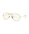 Gold-framed aviator sunglasses with clear photochromic lenses, angled product view