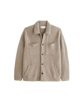 Oatmeal wool shirt jacket with patch chest pockets and horn buttons, flat lay