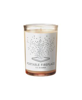 Portable Fireplace scented candle in a clear glass jar with white label, product shot