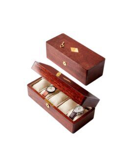 Rosewood-toned wooden watch box with brass lock and linen cushions, shown closed and open with two watches