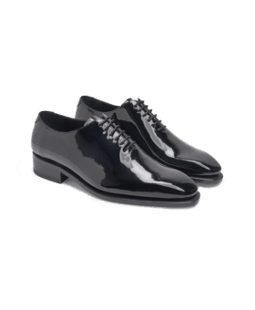 Black patent leather wholecut oxford formal shoes, pair shown at an angle