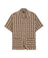 Brown and cream geometric print short sleeve camp collar shirt with chest pockets, flat lay