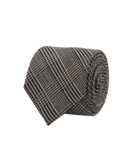 Black and grey glen plaid Prince of Wales check necktie, rolled and shown tip-up