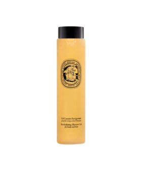 Revitalizing shower gel for body and hair in a tall pale yellow bottle with black cap, product shot