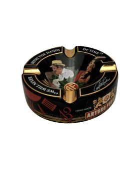 Black and gold Arturo Fuente porcelain cigar ashtray with a painted tobacco-field scene